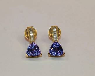 18kt yellow gold Tanzanite & Diamond Earrings featuring approx 3ctw of prong set trillion cut tanzanite purple & blue in color with 14 total diamond weighing approx. .50ctw, earrings 6.3 grams total weight, really nicely made
