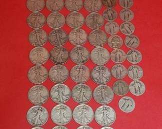 63 Misc Silver coins. 40 - .50 cent walking liberty and 23- .25 cent mixed dates. 90 % silver