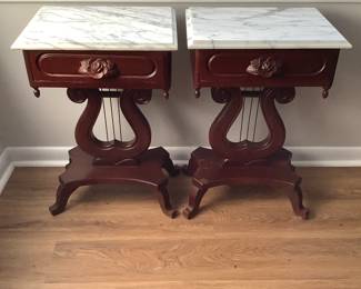 Pair of marble top mahogany lyre tables with rose accents
