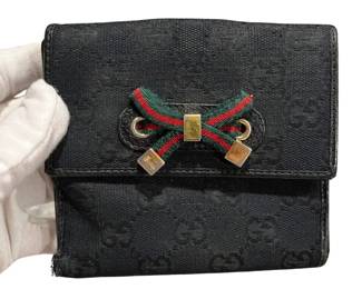 GUCCI LEATHER AND CANVAS WALLET 