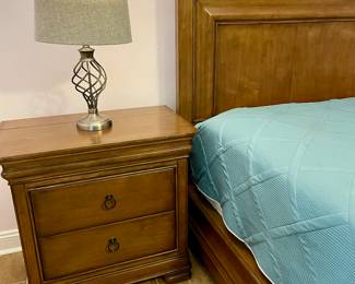 Exquisite Pennsylvania House New Lou Queen Size Sleigh Bed, one nightstand, Dresser with Mirror and Lighted Cabinet. Only One year old. $7,000 New. End Table $800