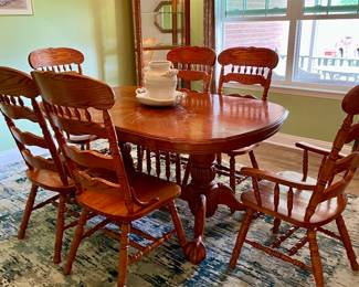 Chairs in Perfect Condition. Table has water Damage on Top but can be sanded down and stained. Rest of the table in Perfect Condition $600 Set