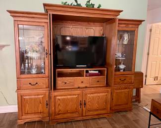 Entertainment Center Comes Apart Pair of Sides $300 Center Piece $200.