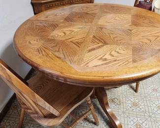 Round Breakfast Table with Two Matching Chairs and one leaf. 