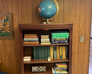 Globe bookcase and books