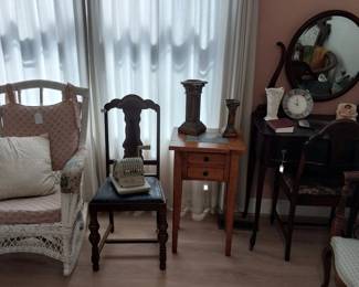 wicker rocker, antique dressing table with wishbone mirror