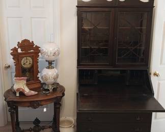 Eastlake end table, antique secretary, Eastlake mantle clock, double globe lamp