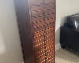 18 drawer wood jewelry storage cabinet 
57” tall x 20” wide x 16” deep