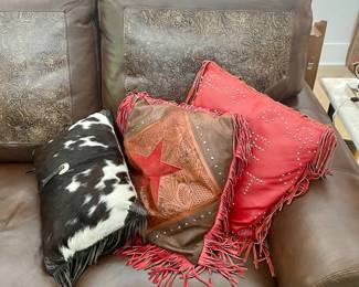 Real leather and hide throw pillows. 