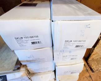 Several batches of tile that would be enough for a room