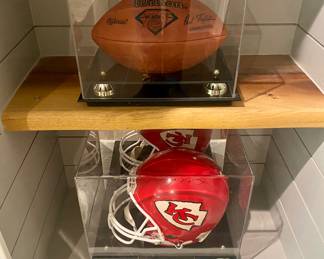 Signed Joe Montana Kansas City Helmut in case and signed Joe Montana Football in case #10158. 
