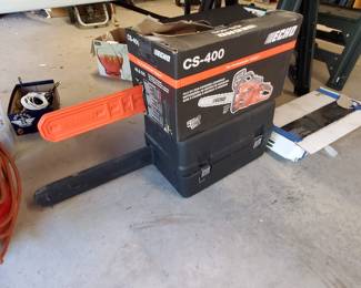 New Echo 18 inch chainsaw, and lightly used 20 in Craftsman Chainsaw