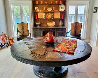 6.5 ft in diameter slate topped wood dining table.   Note: The family has set a reserve price on the Table and the hutch.