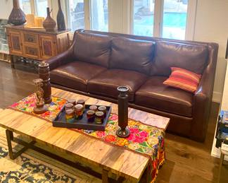 *Bernhardt Leather Sofa 92” in length. 
*Brandt coffee table 65” long x 33.5” wide 

