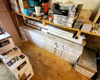 Several boxes of clickable hardwood flooring, enough for a smaller room around 100-150 sq ft