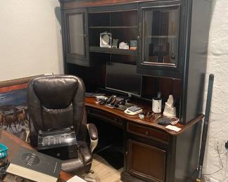 * Serta adjustable office chair 
* Hooker, Seven Seas lighted office desk and hutch. Comes apart in two pieces. Total height 83”, width across 76”, depth 25”. (Note: computer and monitors removed by family)
* Samsung curved flat screen monitor