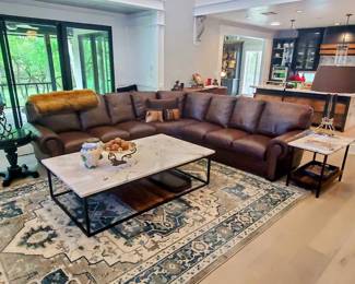 Restoration Hardware table base with custom cut marble top. 5 ft 11” x 3 ft 7”. 
3 piece leather sectional sofa by Classic Leather Inc. 