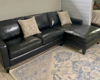 2 piece leather sectional, 6 ft 8” long with both pieces,  depth of side piece is 5 ft 3”. 