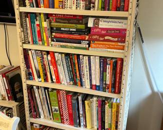 Cook books vintage to newer, metal shelving