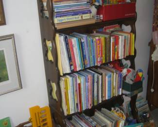 New and vintage children's books, some first editions, wooden bookcase