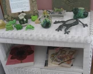 White wicker cabinet and frog collection