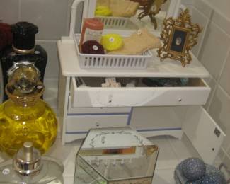 Oversized perfume bottles, wooden mini cabinet, mirrored box