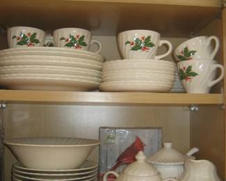 Set of holiday dishes with holly motif