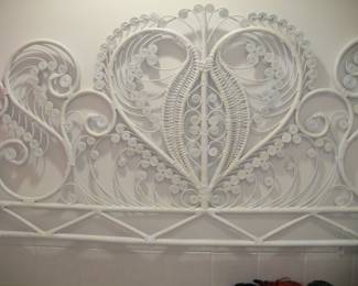 Ornate white wicker headboard