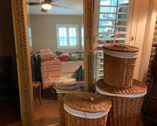 wicker hampers, and large framed mirror