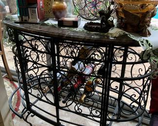 wrought iron wine rack/ table with marble top