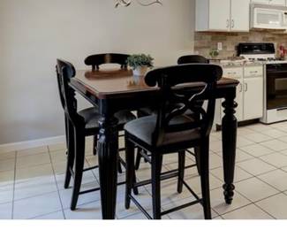 Bar height dining table with extra leaf