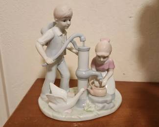 Porcelain Boy and Girl /Water Well Figurine