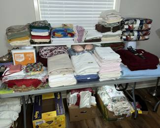 Nice assortment of linens, quilts, blankets, etc.