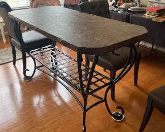 Custom ordered Restoration Hardware chiseled edge granite flecked stone table. Original price was 2500.