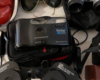 camera and vintage rayban sunglasses