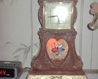 United Clock Boy/Girl Swinging (Works)