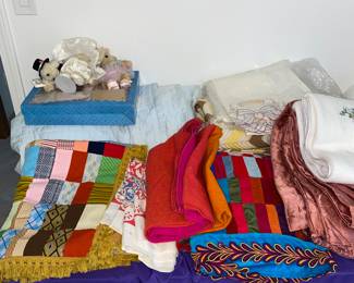 Embroidered and hand made vintage quilts. Cool fabrics and vibrant, funky 70's colors