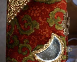 antique photo album on stand with photos