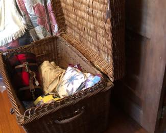 Woven cane trunk with handles.