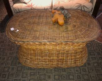 Woven cane coffee table, glass top