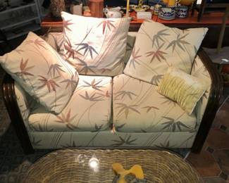 Rattan loveseat with embroidered bamboo fabric.  Matching Sofabed too.  