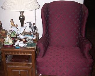 End table, bird figurines, wing back chair