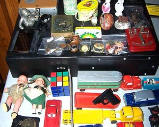 Sample of smalls including Philmore crystal set radio, Tootsie toy trucks, etc...