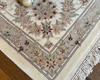 Hand knotted wool and silk rug