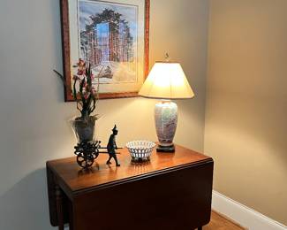 Drop leaf table, Maitland Smith, planter. 
Asian lamp