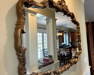 Not only does this mirror add a touch of elegance to your space, but it also helps to create the illusion of a larger room.  Hollywood Regency style adds a fun and whimsical touch 
