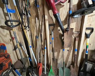 Garden shed- shovels, hole digger, rakes, weed eater, blower