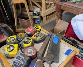 Assortment of measuring tapes, Vintage Henry Dission & Sons cast-steel hand saw...