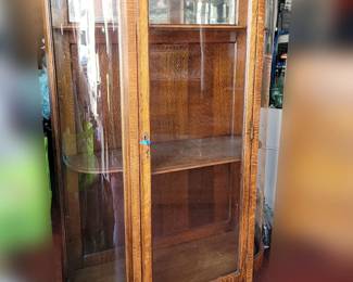Antique curio china display cabinet with claw feet. 38w x 15d (shelves 12" deep) x 62h.  Mirrored back on top shelf. Now $175