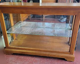 Howard Miller (Burrows or Underwood) display curio cabinet. It opens on both sides. It retails new for up to $1,200. 47w x 14d x 36h. Now $300